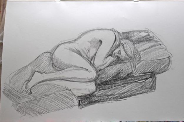 Curled up lying 15-minute pose. Black pencil on paper.